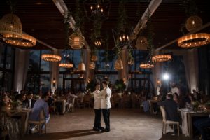 A bride and groom sharing their first dance at a wedding reception at the Ritz Carlton, Dorado Beach.