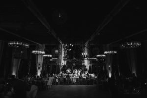 A black and white photo of a wedding reception at Dorado Beach.
