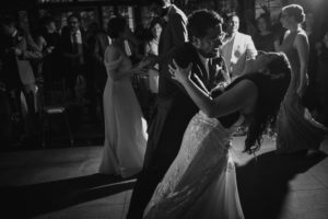 A Wallace and the Loeb Boathouse wedding reception with a bride and groom dancing.