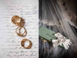 A wedding veil and wedding rings on a piece of paper at St. Francis Xavier chapel