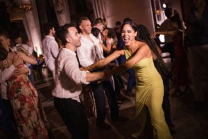 A man and woman gracefully dancing at a wedding reception at the Ritz Carlton Dorado Beach.