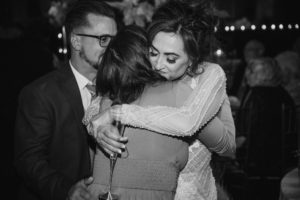 A bride and groom hugging at a NYC wedding reception held at Capitale.