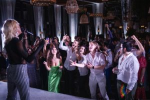 Guests dancing at a wedding reception held at the Ritz Carlton Dorado Beach.