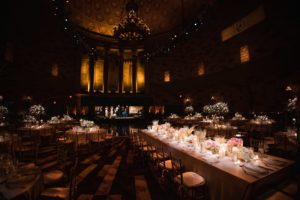 A Gotham Hall wedding reception set up in a large ballroom.