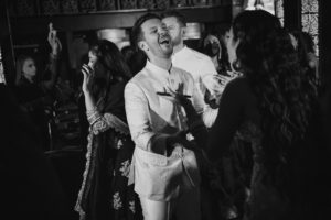 A bride and groom dancing at a wedding reception at Gotham Hall.