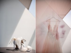Two pictures of a wedding dress and shoes on a table at 74 Wythe.