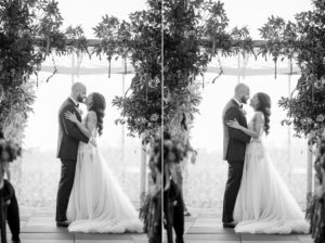 Two black and white photos capturing a wedding ceremony at 74 Wythe, with a passionate kiss shared by the bride and groom.