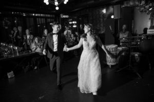 A bride and groom gracefully dancing at their wedding reception held at 501 Union in Brooklyn.