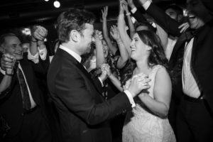 A bride and groom dancing at their wedding in a black and white photo at 501 Union in Brooklyn.