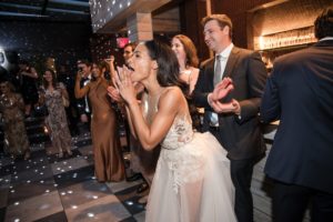 The bride and groom gracefully dance at their wedding reception at 74 Wythe.