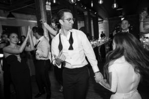 A bride and groom dancing at a wedding reception in New York.