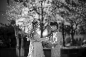 A man and a woman in traditional wedding dress.