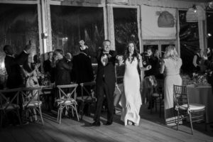 Description: A bride and groom dance at their wedding reception in New York.