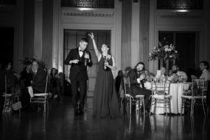 A black and white photo of a couple dancing at a wedding reception in New York.