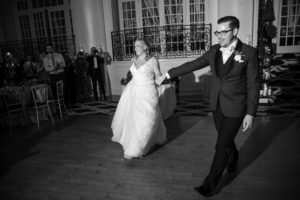 A bride and groom elegantly dancing at their New York wedding.