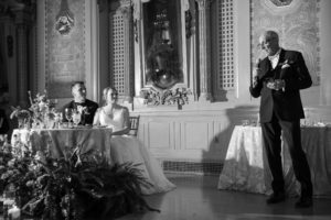 A bride and groom giving a toast at a New York wedding.