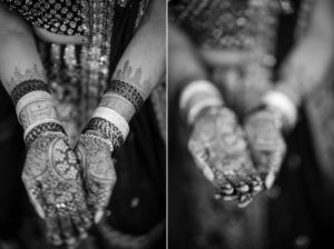 A bride's hands adorned with exquisite henna tattoos, capturing the essence of a cherished New York wedding.