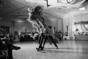 A beautiful black and white photo capturing a couple dancing gracefully at their New York wedding.