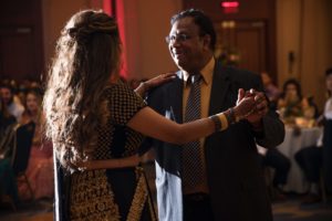 A man and woman dancing at a wedding reception in New York.