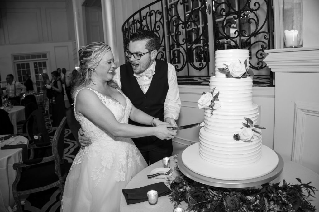 A New York couple cutting their wedding cake.