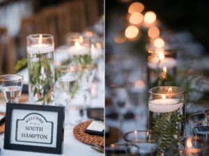 A wedding table setting with candles and a sign.
