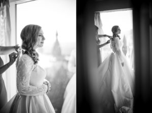 A bride is getting ready for her wedding in a window overlooking New York.