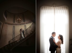A newly married couple standing in front of a staircase at their wedding venue in New York.
