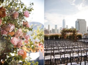 A wedding ceremony with flowers and chairs in front of the New York City skyline.