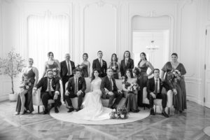 A black and white photo capturing a wedding party in New York.