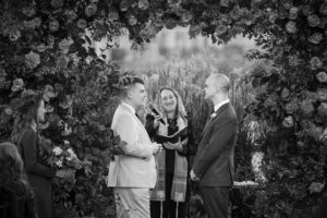 A beautiful black and white wedding photo capturing a couple exchanging vows in New York.