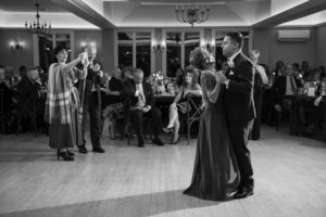 A black and white photo of a couple's first dance at their New York wedding.