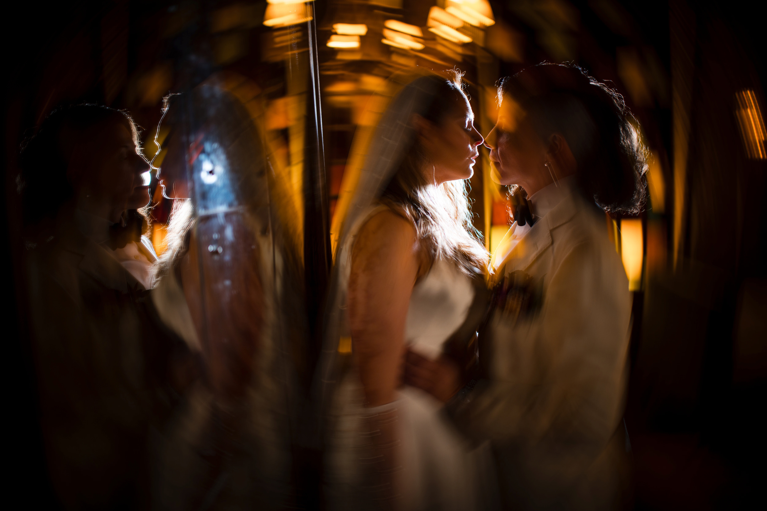 Two brides on a rainy afternoon at a Beekman Hotel wedding in NYC