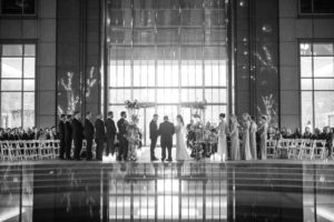 A black and white photo of a wedding ceremony in New York.