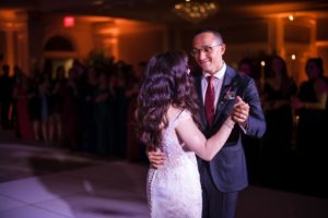 A bride and groom sharing their first dance at their wedding reception in New York.