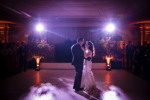 A bride and groom share their first dance at a New York wedding reception.