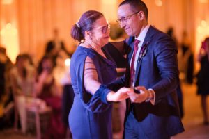 A man and woman dancing at a wedding reception in New York.