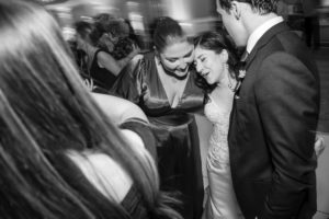 Black and white photo of a bride and groom having a dance at their New York wedding.