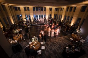 An aerial view of a wedding reception in a large room in New York.