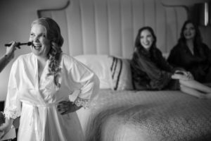 A bride preparing for her wedding day in a hotel room in New York.