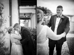 A bride and groom sharing an affectionate embrace outside of a New York wedding venue.