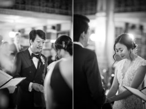 A bride and groom exchange rings during their New York wedding ceremony.