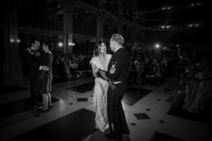 A black and white photo capturing the magical first dance of a bride and groom at their New York wedding.