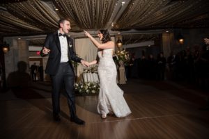 A bride and groom sharing their first dance at a wedding reception in New York.
