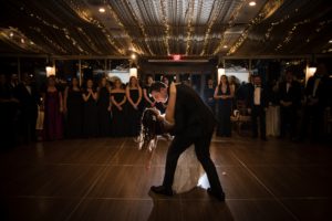 A bride and groom sharing their first dance at their wedding reception in New York.