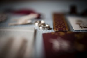 Wedding rings and other items on a table in New York.