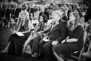 A black and white photo capturing a wedding ceremony in New York.
