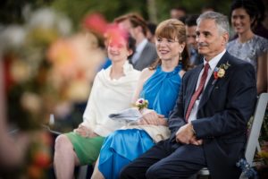 A group of people sitting at a wedding ceremony in New York.