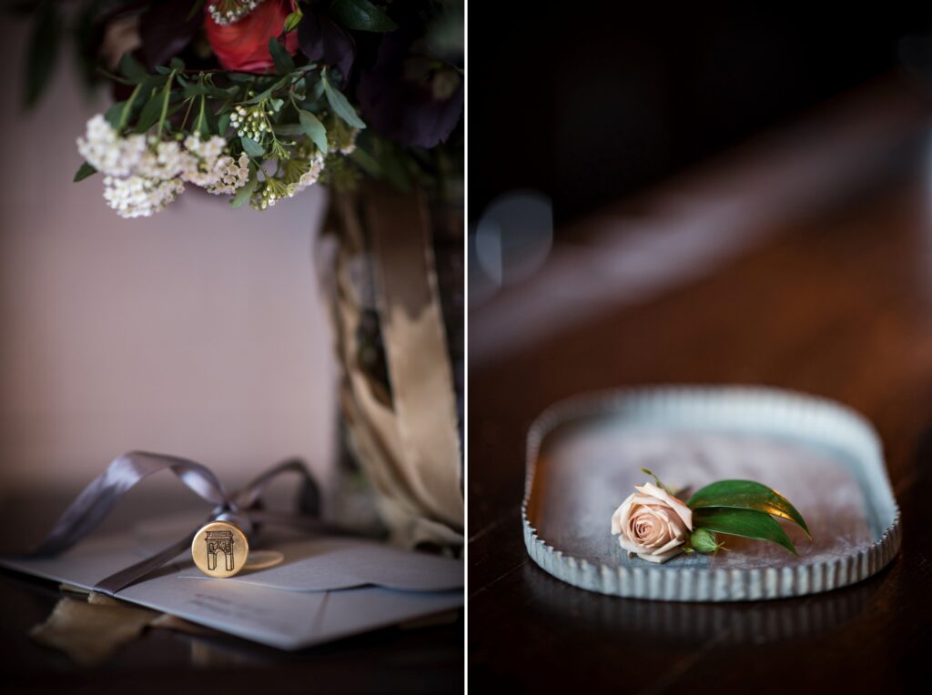 A bouquet of roses and an envelope on a table at a Bowery Hotel wedding.