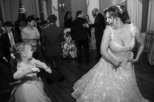 A bride and her daughter dancing on the dance floor at their New York wedding.