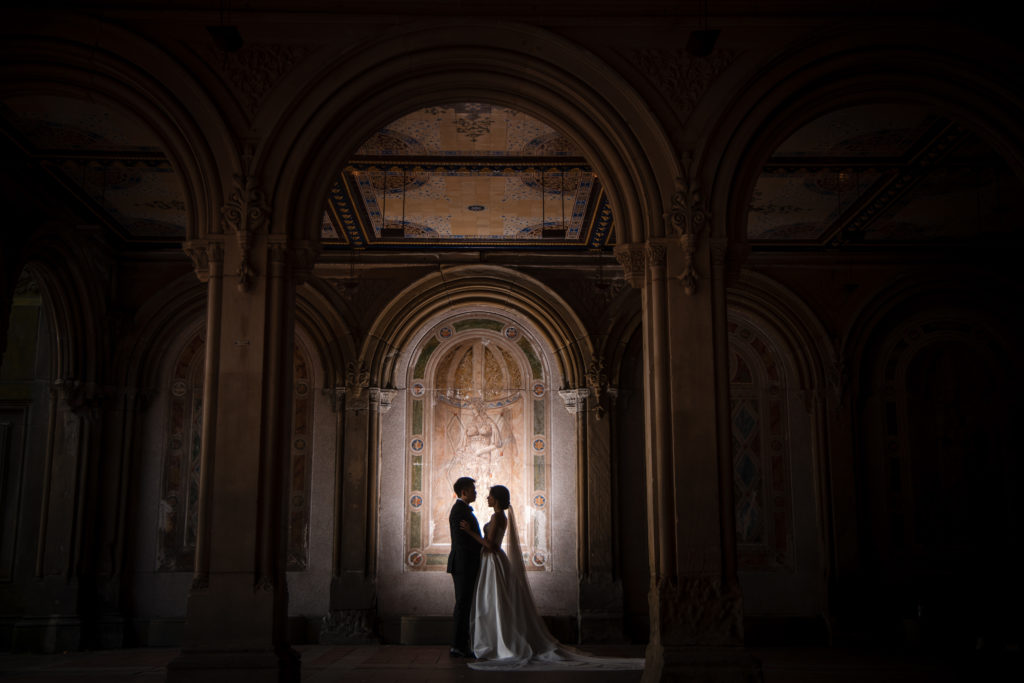 couple under bethesda terrace at night wedding photography